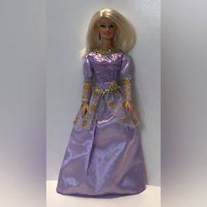 Vintage Barbie with purple dress.